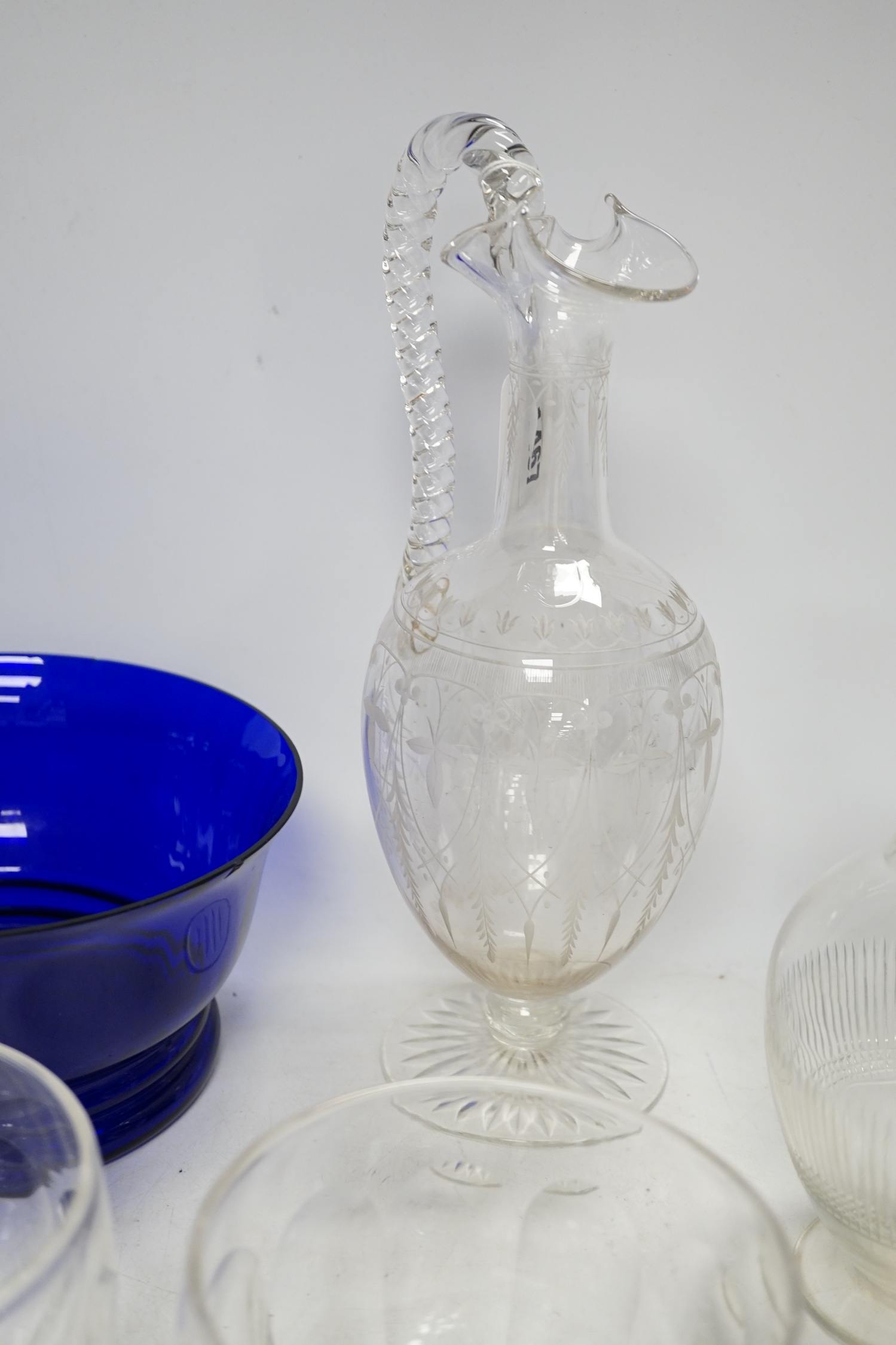 A Victorian ewer, a flask, two finger bowls and a blue glass bowl, ewer 30cm high